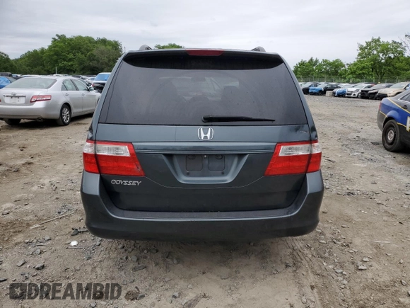 2006 Honda Odyssey EX-L z VIN 5FNRL38706B019434, wystawiony jako Copart lot #57397755 z przebiegiem 175 406 mil mil oraz Szkoda całkowita • Salvage title. Historia ofert i sprzedaży dostępna na DreamBid. Obrazek 6.