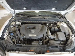 2021 Mazda 6 Carbon Edition with VIN JM1GL1WY9M1614117, listed as a IAAI auction lot 41305576 with 54,670 mi miles and . Bid and sale history available at DreamBid. Image 10.