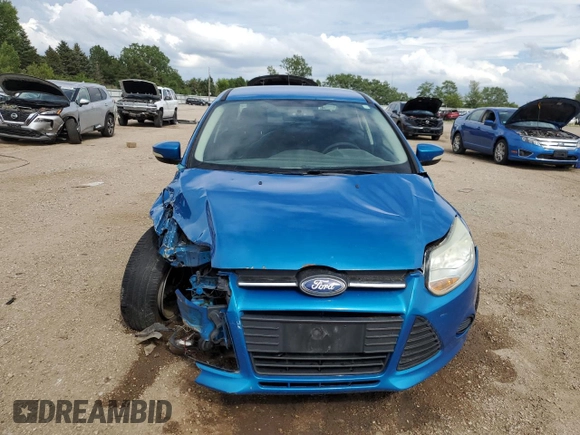 2013 Ford Focus SE with VIN 1FADP3F23DL208259, listed as a Copart auction lot 62009465 with 218,363 mi miles and Salvage title. Bid and sale history available at DreamBid. Image 5.