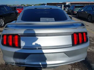 2015 Ford Mustang V6 z VIN 1FA6P8AM8F5369227, wystawiony jako IAAI lot #42607851 z przebiegiem 135 428 mil mil oraz . Historia ofert i sprzedaży dostępna na DreamBid. Obrazek 16.