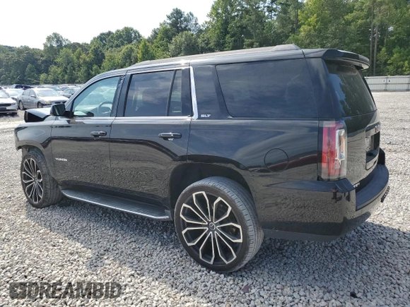 2015 GMC Yukon SLT with VIN 1GKS2BKC2FR666386, listed as a Copart auction lot 68471204 with 154,041 mi miles and Salvage Title. Bid and sale history available at carsss.com. Image 2.