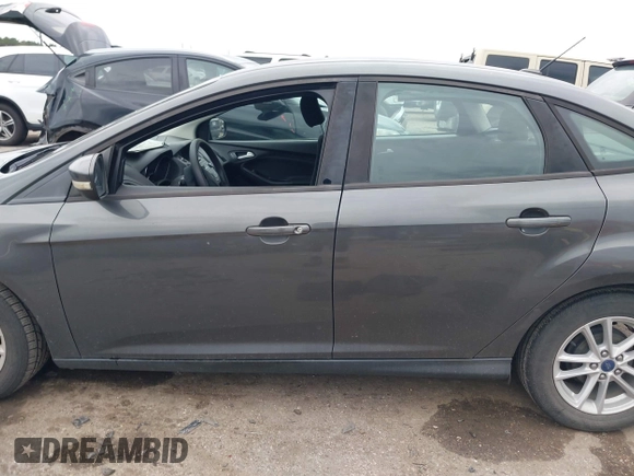 2017 Ford Focus SE z VIN 1FADP3F23HL325751, wystawiony jako IAAI lot #42182722 z przebiegiem 46 119 mil mil oraz . Historia ofert i sprzedaży dostępna na DreamBid. Obrazek 14.