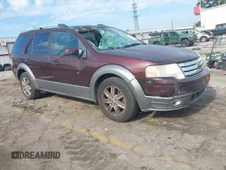 2009 Ford Taurus X SEL z VIN 1FMDK02W99GA00222, wystawiony jako IAAI lot #42712503 z przebiegiem 160 496 mil mil oraz . Historia ofert i sprzedaży dostępna na DreamBid. Obrazek 1.