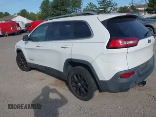 2015 Jeep Cherokee Latitude with VIN 1C4PJLCS6FW689607, listed as a IAAI auction lot 42103286 with 142,479 mi miles. Bid and sale history available at carsss.com. Image 3.