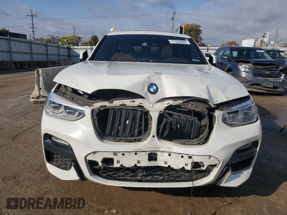 2019 BMW X4 xDrive30i with VIN 5UXUJ3C5XKLG54286, listed as a Copart auction lot 77333284 with 99,771 mi miles and Salvage Title. Bid and sale history available at carsss.com. Image 5.