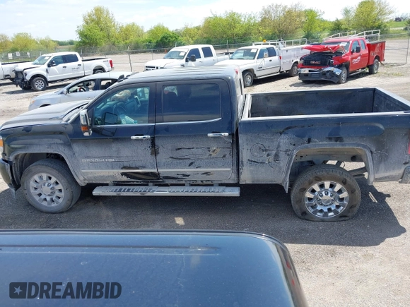 2016 GMC Sierra 2500HD Denali with VIN 1GT12UEG5GF307263, listed as a IAAI auction lot 42214245 with 129,895 mi miles and . Bid and sale history available at DreamBid. Image 14.