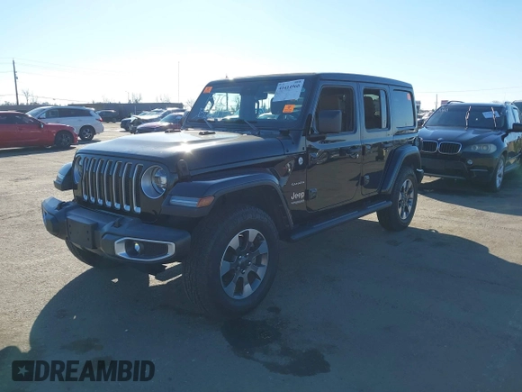 2021 Jeep Wrangler Unlimited Sahara Altitude z VIN 1C4HJXEN5MW659188, wystawiony jako IAAI lot #41414960 z przebiegiem 72 698 mil mil oraz . Historia ofert i sprzedaży dostępna na DreamBid. Obrazek 2.