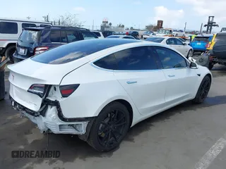 2020 Tesla Model 3 Long Range with VIN 5YJ3E1EB9LF795246, listed as a IAAI auction lot 41895750 with 163,061 mi miles and . Bid and sale history available at DreamBid. Image 4.