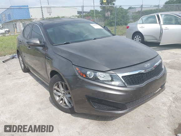 2011 Kia Optima LX with VIN KNAGM4A70B5162915, listed as a IAAI auction lot 42094325 with 156,169 mi miles and . Bid and sale history available at carsss.com. Image 1.