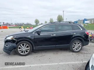 2011 Mazda CX-9 Grand Touring z VIN JM3TB2DAXB0300466, wystawiony jako IAAI lot #41921411 z przebiegiem 196 257 mil mil oraz . Historia ofert i sprzedaży dostępna na DreamBid. Obrazek 14.