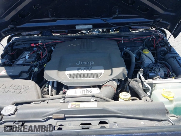 2013 Jeep Wrangler Sport with VIN 1C4AJWAG3DL627179, listed as a IAAI auction lot 42262246 with 33,536 mi miles and . Bid and sale history available at DreamBid. Image 10.