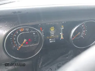 2023 Jeep Wrangler Sport S with VIN 1C4HJXDN9PW540842, listed as a IAAI auction lot 41712336 with 36,017 mi miles and . Bid and sale history available at DreamBid. Image 7.