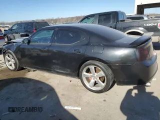 2006 Dodge Charger SRT-8 with VIN 2B3KA73W76H421802, listed as a Copart auction lot 83709404 with Not Provided miles and Salvage Title. Bid and sale history available at DreamBid. Image 2.