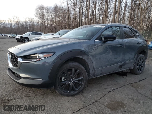 2023 Mazda CX-30 S Carbon Edition с VIN 3MVDMBCM3PM500403, выставлен на аукционе Copart как лот 88146095 с пробегом 29 861 миль миль и Списание • Salvage title. История ставок и продаж доступна на DreamBid. Изображение 1.