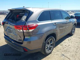 2019 Toyota Highlander LE with VIN 5TDZZRFH6KS306098, listed as a IAAI auction lot 41712844 with 92,056 mi miles and . Bid and sale history available at DreamBid. Image 4.