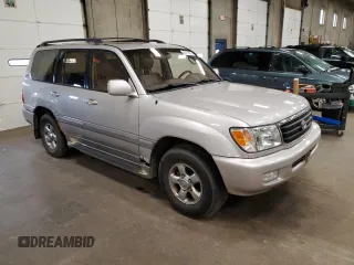 2002 Toyota Land Cruiser z VIN JTEHT05J922018964, wystawiony jako Copart lot #60111015 z przebiegiem 245 890 mil mil oraz Czysty tytuł • Clean title. Historia ofert i sprzedaży dostępna na DreamBid. Obrazek 4.