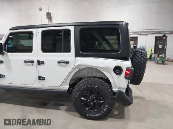 2023 Jeep Wrangler Sport S with VIN 1C4HJXDN2PW632584, listed as a IAAI auction lot 41965191 with 20,288 mi miles and . Bid and sale history available at DreamBid. Image 6.