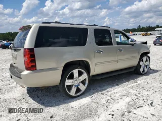 2013 Chevrolet Suburban LT z VIN 1GNSCJE06DR290395, wystawiony jako Copart lot #61279575 z przebiegiem 250 302 mil mil oraz Szkoda całkowita • Salvage title. Historia ofert i sprzedaży dostępna na DreamBid. Obrazek 3.