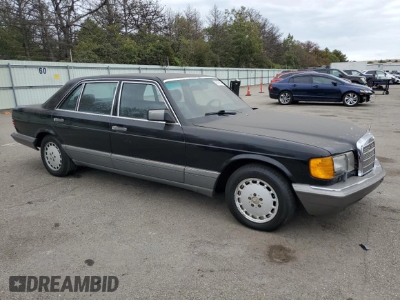1990 Mercedes-Benz 560 with VIN WDBCA39E7LA509137, listed as a Copart auction lot 70086544 with 167,102 mi miles and Clean Title. Bid and sale history available at DreamBid. Image 4.