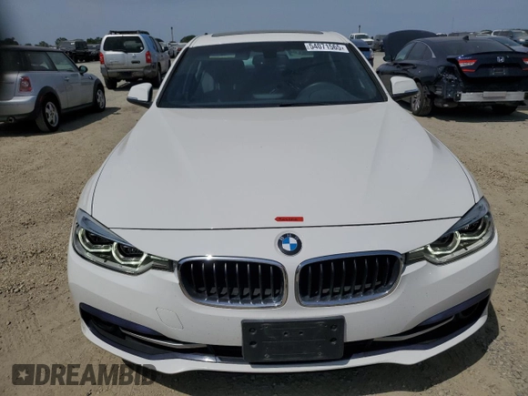 2018 BMW 3 Series 330i xDrive with VIN WBA8D9G56JNU71570, listed as a Copart auction lot 54071565 with 73,305 mi miles and Salvage title. Bid and sale history available at DreamBid. Image 5.