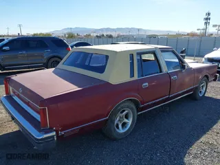 1984 Lincoln Town Car with VIN 1LNBP96FXEY671362, listed as a IAAI auction lot 41367432 with 81,205 mi miles. Bid and sale history available at carsss.com. Image 4.