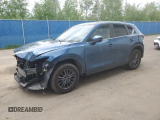 2020 Mazda CX-5 Touring z VIN JM3KFBCM1L1762759, wystawiony jako Copart lot #59280495 z przebiegiem 53 029 mil mil oraz Szkoda całkowita • Salvage title. Historia ofert i sprzedaży dostępna na DreamBid. Obrazek 1.