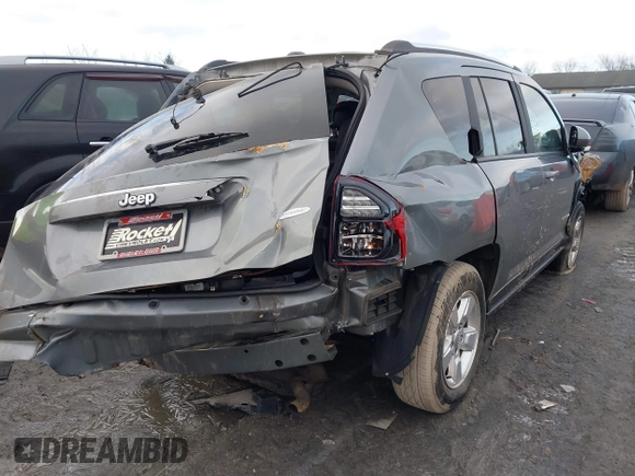 2014 Jeep Compass High Altitude with VIN 1C4NJCEA4ED620730, listed as a IAAI auction lot 41491027 with 73,784 mi miles. Bid and sale history available at carsss.com. Image 4.