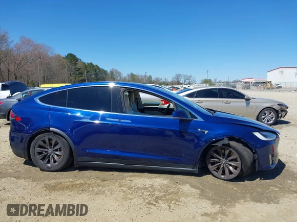 2017 Tesla Model X 90D z VIN 5YJXCBE26HF079022, wystawiony jako IAAI lot #41847954 z przebiegiem 74 940 mil mil oraz . Historia ofert i sprzedaży dostępna na DreamBid. Obrazek 14.