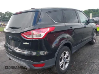 2013 Ford Escape SE with VIN 1FMCU0GX4DUA95161, listed as a IAAI auction lot 42393874 with 190,390 mi miles and . Bid and sale history available at DreamBid. Image 4.