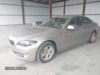 2013 BMW 5 Series 528i with VIN WBAXG5C52DDY35141, listed as a IAAI auction lot 41883031 with 112,917 mi miles and . Bid and sale history available at carsss.com. Image 2.