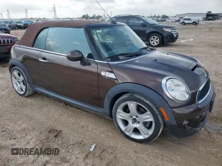 2011 MINI Convertible S with VIN WMWZP3C58BTX83725, listed as a Copart auction lot 60921875 with 45,400 mi miles and Salvage title. Bid and sale history available at DreamBid. Image 4.