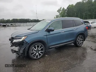 2022 Honda Pilot Touring 7-Passenger z VIN 5FNYF5H63NB015091, wystawiony jako Copart lot #56323725 z przebiegiem 28 614 mil mil oraz Szkoda całkowita • Salvage title. Historia ofert i sprzedaży dostępna na DreamBid. Obrazek 1.