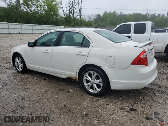 2012 Ford Fusion SE z VIN 3FAHP0HA4CR185059, wystawiony jako Copart lot #56875985 z przebiegiem 173 644 mil mil oraz Nie do naprawy. Historia ofert i sprzedaży dostępna na DreamBid. Obrazek 2.
