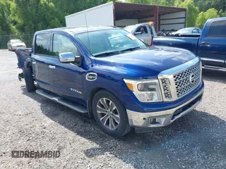 2017 Nissan Titan SL with VIN 1N6AA1E68HN565628, listed as a IAAI auction lot 42465438 with 168,606 mi miles and . Bid and sale history available at DreamBid. Image 1.