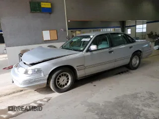 1995 Ford Crown Victoria LX z VIN 2FALP74W3SX128971, wystawiony jako Copart lot #44523785 z przebiegiem 207 749 mil mil oraz Szkoda całkowita • Salvage title. Historia ofert i sprzedaży dostępna na DreamBid. Obrazek 1.