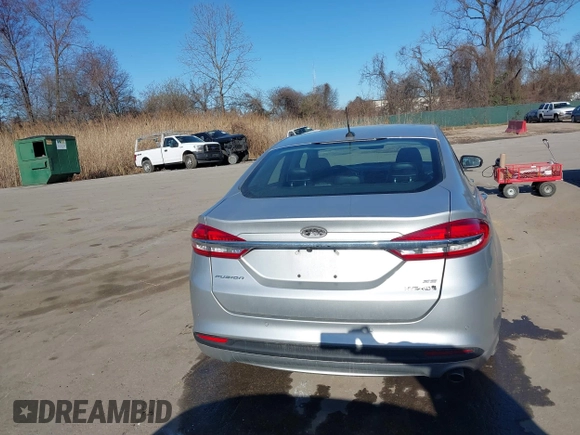 2018 Ford Fusion SE with VIN 3FA6P0LU1JR272522, listed as a IAAI auction lot 41796432 with 123,471 mi miles and . Bid and sale history available at DreamBid. Image 16.