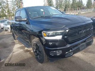 2023 Ram 1500 Laramie with VIN 1C6SRFJT9PN540381, listed as a IAAI auction lot 41827448 with 34,202 mi miles and . Bid and sale history available at DreamBid. Image 1.