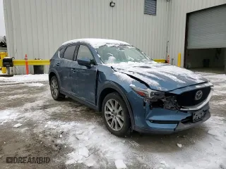 2021 Mazda CX-5 Grand Touring Reserve with VIN JM3KFBAY1M0313207, listed as a Copart auction lot 44812345 with 43,840 mi miles and Salvage Title. Bid and sale history available at carsss.com. Image 12.