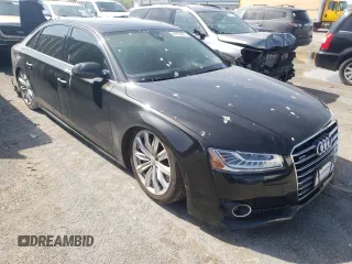 2017 Audi A8 Sport z VIN WAU43AFD8HN008951, wystawiony jako Copart lot #61066193 z przebiegiem Nie podano mil oraz Nie do naprawy • Non repairable. Historia ofert i sprzedaży dostępna na DreamBid. Obrazek 4.