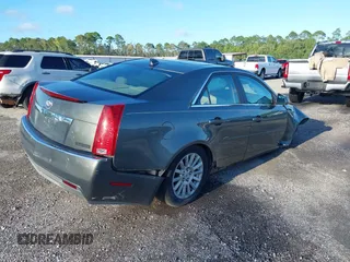 2011 Cadillac CTS Luxury with VIN 1G6DE5EY5B0154563, listed as a IAAI auction lot 36806985 with 92,635 mi miles and . Bid and sale history available at DreamBid. Image 4.