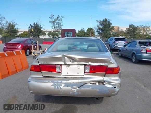 2000 Toyota Camry LE z VIN JT2BF22K5Y0258522, wystawiony jako IAAI lot #41998874 z przebiegiem 300 186 mil mil oraz . Historia ofert i sprzedaży dostępna na DreamBid. Obrazek 6.