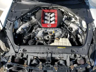 2018 Nissan GT-R Premium с VIN JN1AR5EF9JM710421, выставлен на аукционе Copart как лот 84895244 с пробегом 27 217 миль миль и Списание • Salvage title. История ставок и продаж доступна на DreamBid. Изображение 11.
