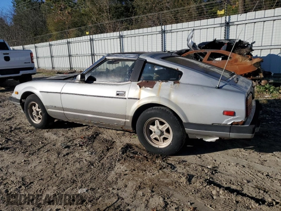 1983 Datsun 280ZX z VIN JN1HZ04S6DX571982, wystawiony jako Copart lot #86317294 z przebiegiem Nie podano mil oraz Tytuł czysty. Historia ofert i sprzedaży dostępna na DreamBid. Obrazek 2.