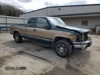 1995 GMC Sierra 1500 z VIN 2GTEK19K3S1511767, wystawiony jako Copart lot #51977295 z przebiegiem 215 667 mil mil oraz Szkody całkowita. Historia ofert i sprzedaży dostępna na DreamBid. Obrazek 4.