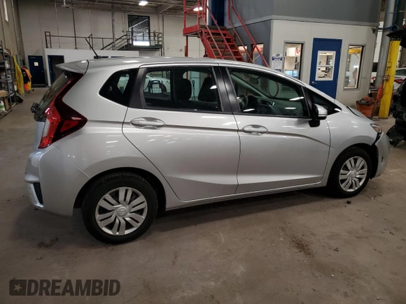 2015 Honda Fit LX с VIN 3HGGK5H56FM720996, выставлен на аукционе Copart как лот 57565945 с пробегом 90 222 миль миль и Списание • Salvage title. История ставок и продаж доступна на DreamBid. Изображение 3.