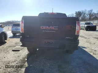 2021 GMC Canyon 4WD AT4 w/Leather with VIN 1GTG6FEN4M1155641, listed as a Copart auction lot 86793644 with 36,940 mi miles and Salvage Title. Bid and sale history available at carsss.com. Image 6.
