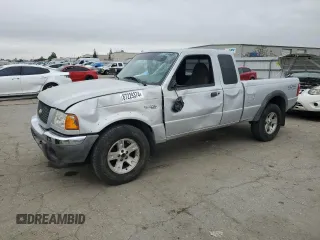 2002 Ford Ranger XLT Off-Road with VIN 1FTZR45U12TA27368, listed as a Copart auction lot 87229374 with 111,159 mi miles and Salvage title. Bid and sale history available at DreamBid. Image 1.