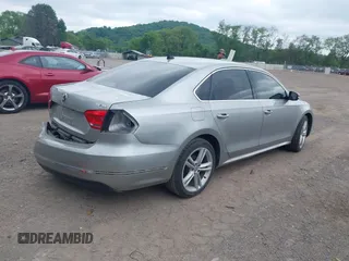2014 Volkswagen Passat SE с VIN 1VWBN7A36EC045247, выставлен на аукционе IAAI как лот 42295047 с пробегом 118 431 миль миль и . История ставок и продаж доступна на DreamBid. Изображение 4.