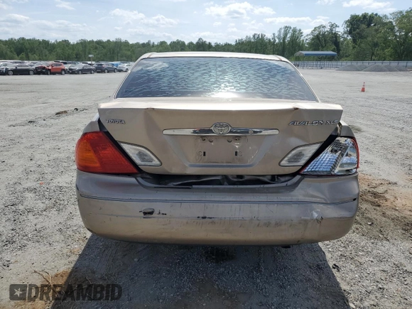 2001 Toyota Avalon XL z VIN 4T1BF28B41U191680, wystawiony jako Copart lot #53956735 z przebiegiem 177 149 mil mil oraz Szkoda całkowita • Salvage title. Historia ofert i sprzedaży dostępna na DreamBid. Obrazek 6.