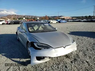 2016 Tesla Model S 90D with VIN 5YJSA1E26GF147974, listed as a Copart auction lot 82815404 with 126,609 mi miles and Salvage Title. Bid and sale history available at DreamBid. Image 10.